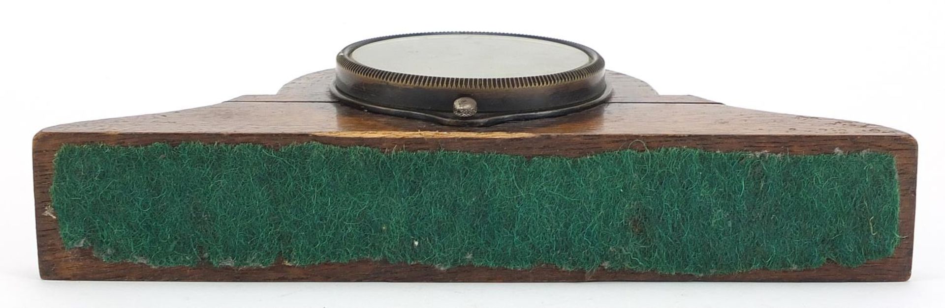 Vintage Smiths car clock housed in an oak frame, the clock numbered 63.051, 26.5cm wide - Image 3 of 3