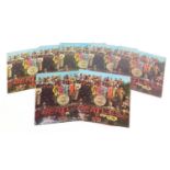 Seven Sgt Pepper's Lonely Hearts Club Band vinyl LP records by The Beatles, six mono, one stereo,