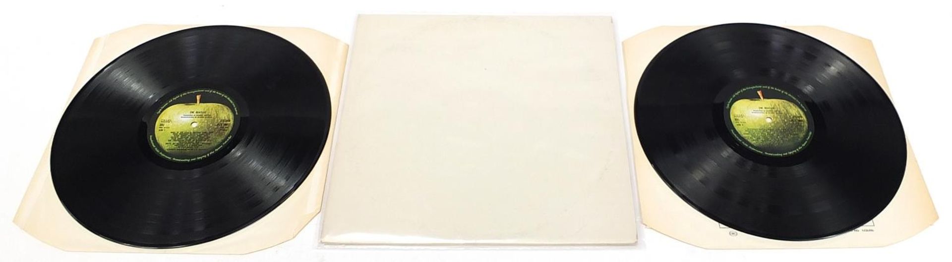 Four White Album vinyl LP records by The Beatles with poster and four pictures to include numbers - Image 2 of 17