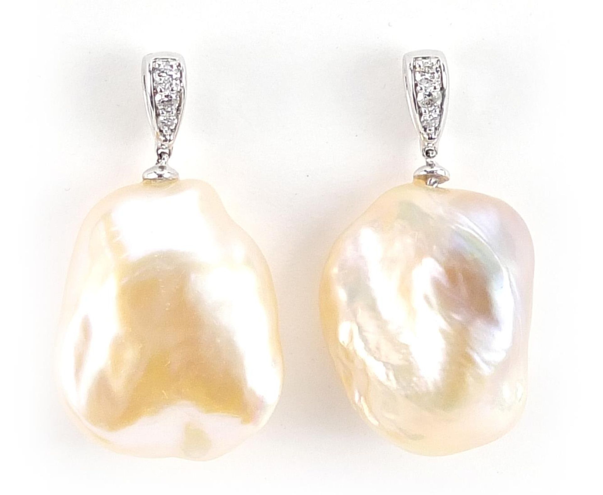 Pair of 9ct white gold baroque pearl and diamond drop earrings, 2.8cm high, 9.2g