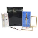 Swatch, four Swatch Collector's Club wristwatches and a pair of Swatch watch cufflinks