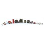 Diecast vehicles and accessories including Britains Gat gun, Dinky telephone box and Lone Star