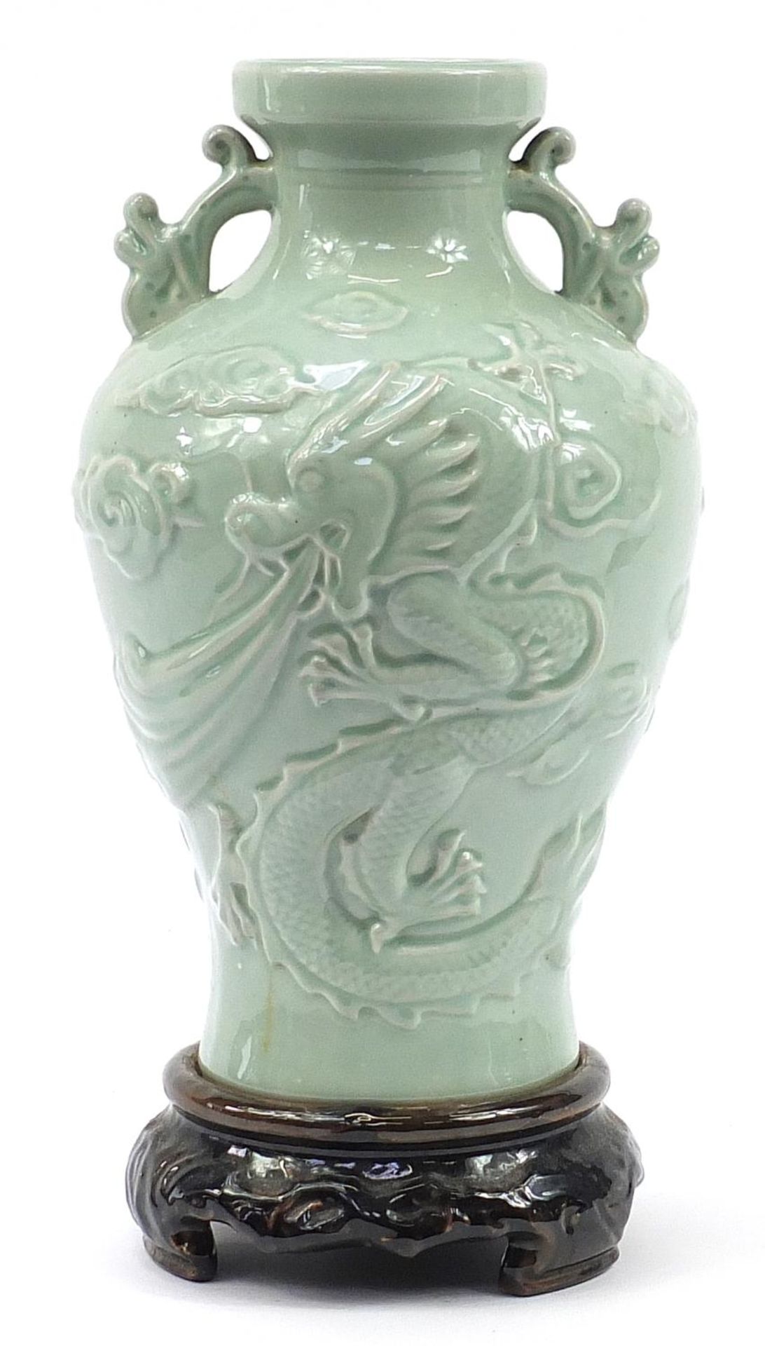 Large Chinese porcelain vase on stand with twin handles having a celadon glaze, decorated in