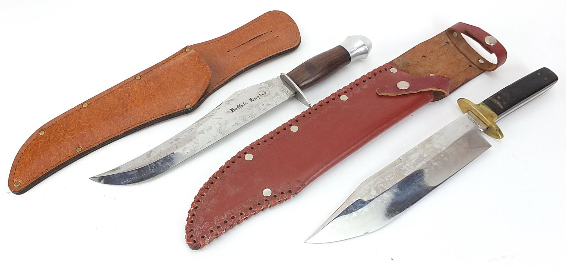 Two Bowie knives with leather sheaths including one with horn handle, impressed Bexfield of