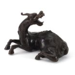 Chinese patinated bronze incense burner in the form of a mythical dragon, 25.5cm in length