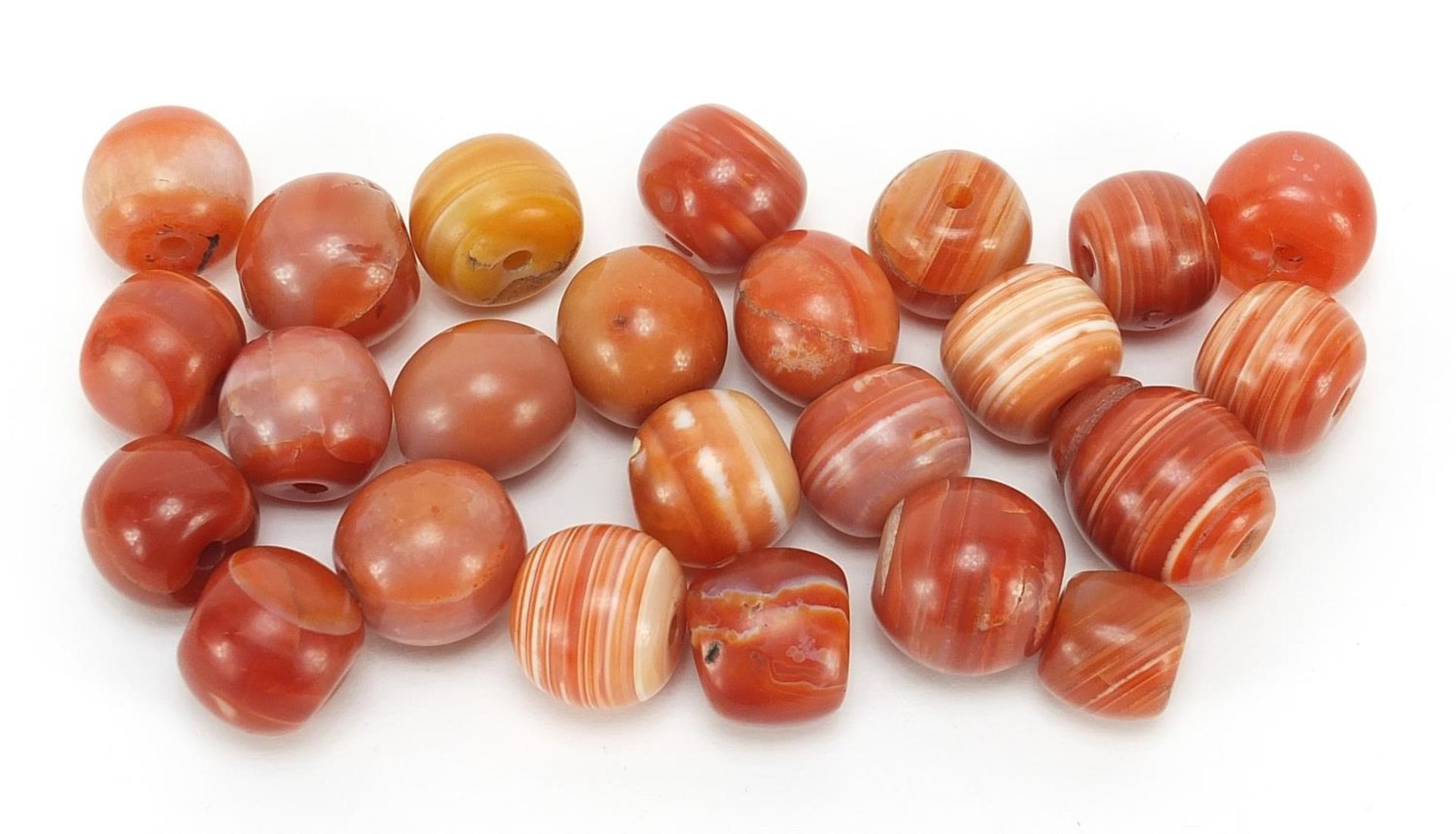 Group of Islamic agate beads, each approximately 2cm in diameter