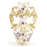 Zsolnay Pecs, Hungarian pottery vase with twin handles hand painted with stylized flowers, Fischer J