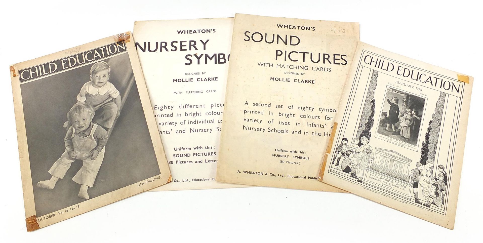 Vintage child's educational posters including Wheaton's Nursery Symbols designed by Mollie Clarke