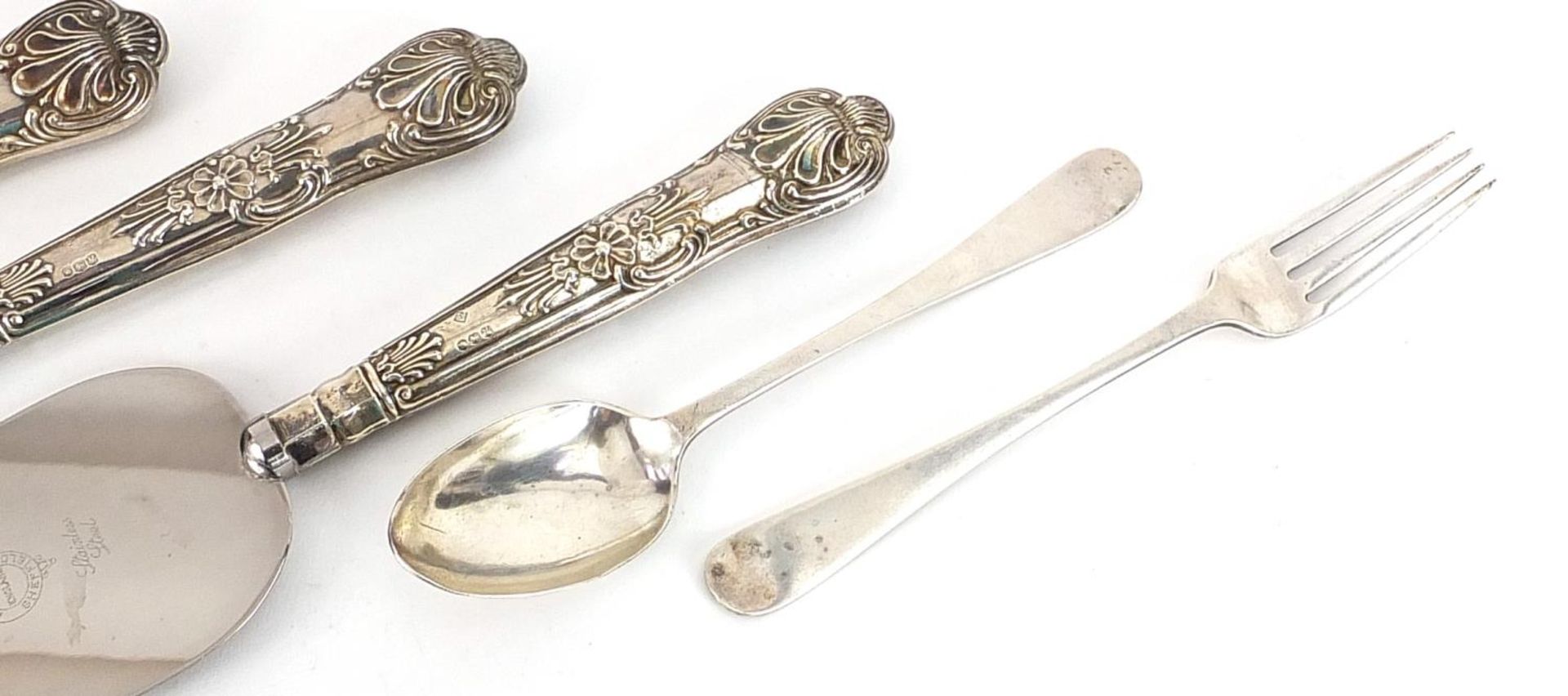 Silver items comprising teaspoon, fork, two silver handled bread knives and a silver handled cake - Image 3 of 5
