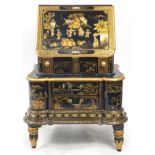 Chinese black lacquered chinoiserie bureau, the fall with fitted interior above three drawers and a