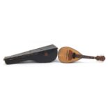 Inlaid rosewood melon shaped mandolin with protective carry case, Pietro Tonelli label to the