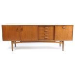 Mid century teak sideboard with pair of cupboard doors, four drawers and drop down door, 79cm H x