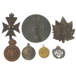 Badges and medallions, some military interest including circular bronze example of Dante, the