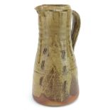 Jim Malone for Ainstable, studio pottery jug with incised decoration, impressed marks to the handle,