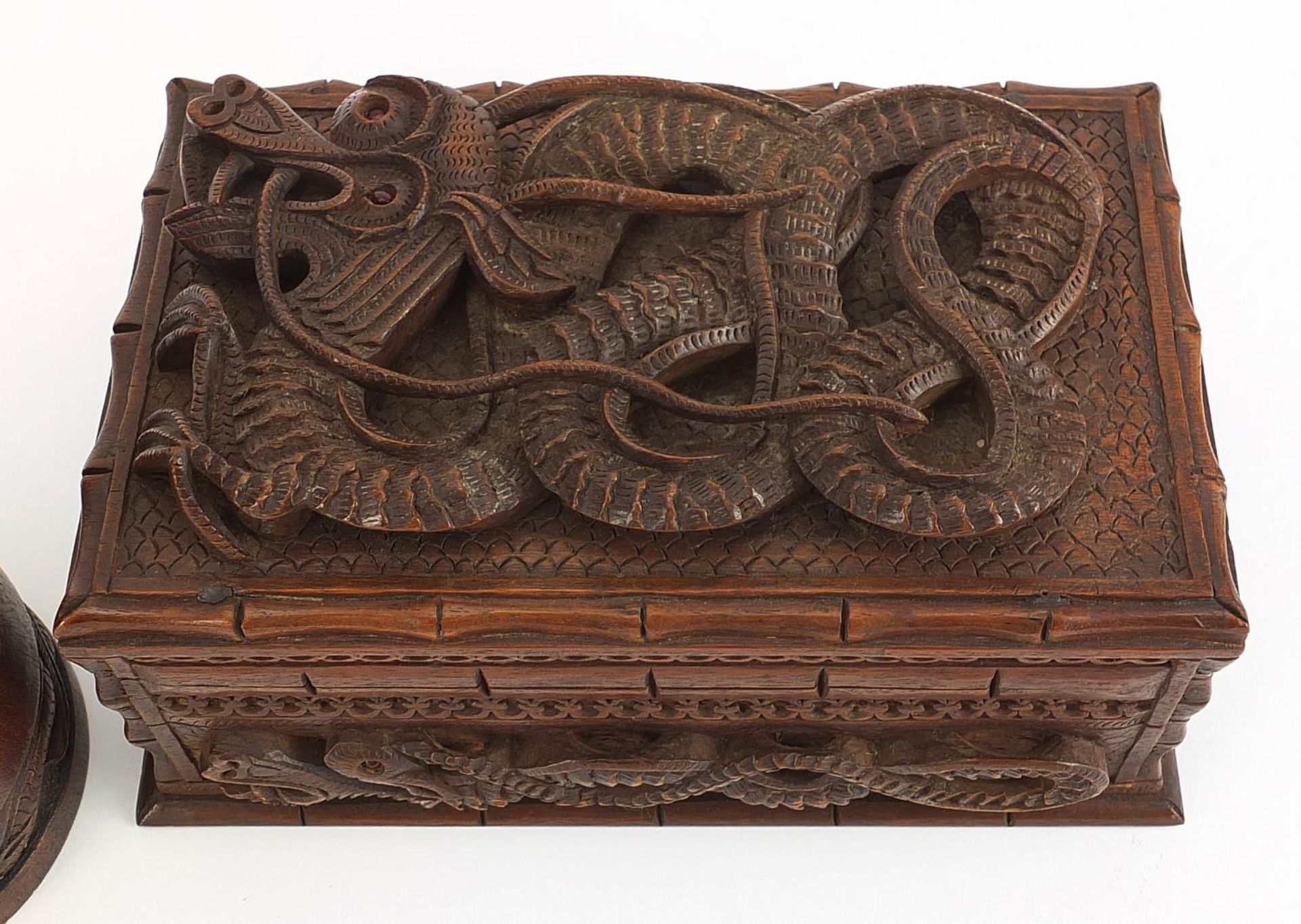 Chinese hardwood casket deeply carved with a dragon together with a similar tankard, the largest - Image 2 of 4