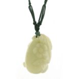 Chinese pale green jade fruit pendant carved with a flower on cord necklace with jade beads, the