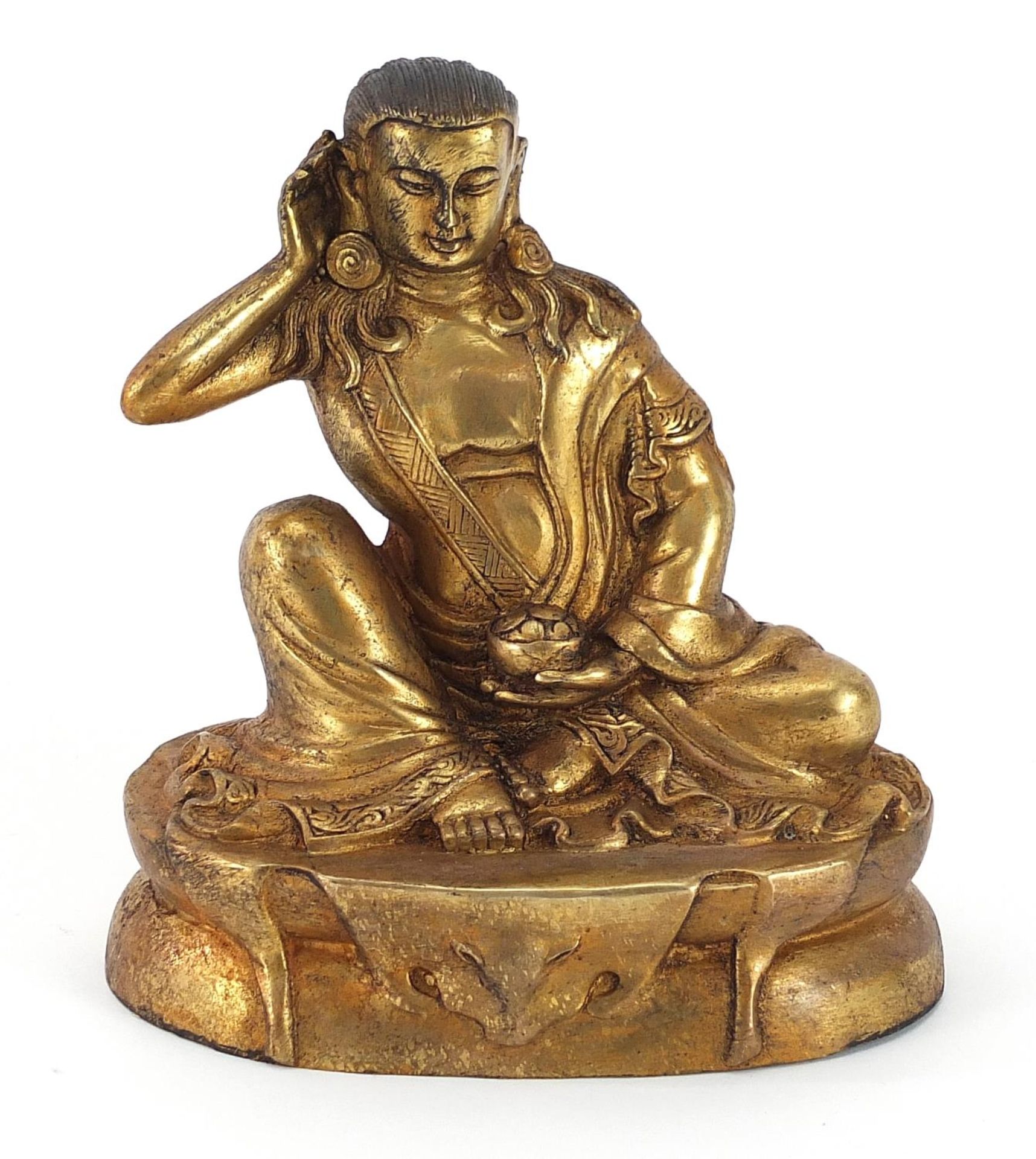 Chino Tibetan patinated bronze figure of a deity, 14cm high