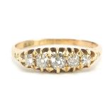 18ct gold diamond five stone ring, the largest diamond approximately 3.5mm in diameter, size R, 3.1g