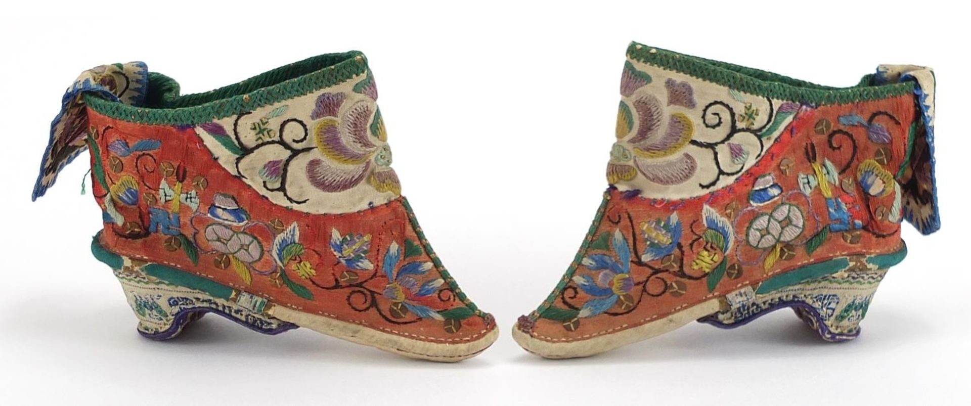 Pair of Chinese silk lotus shoes embroidered with flowers, each 11cm in length