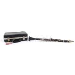 Boosey & Hawkes four piece ebony Emperor clarinet with fitted case, serial number 335457, 68cm in