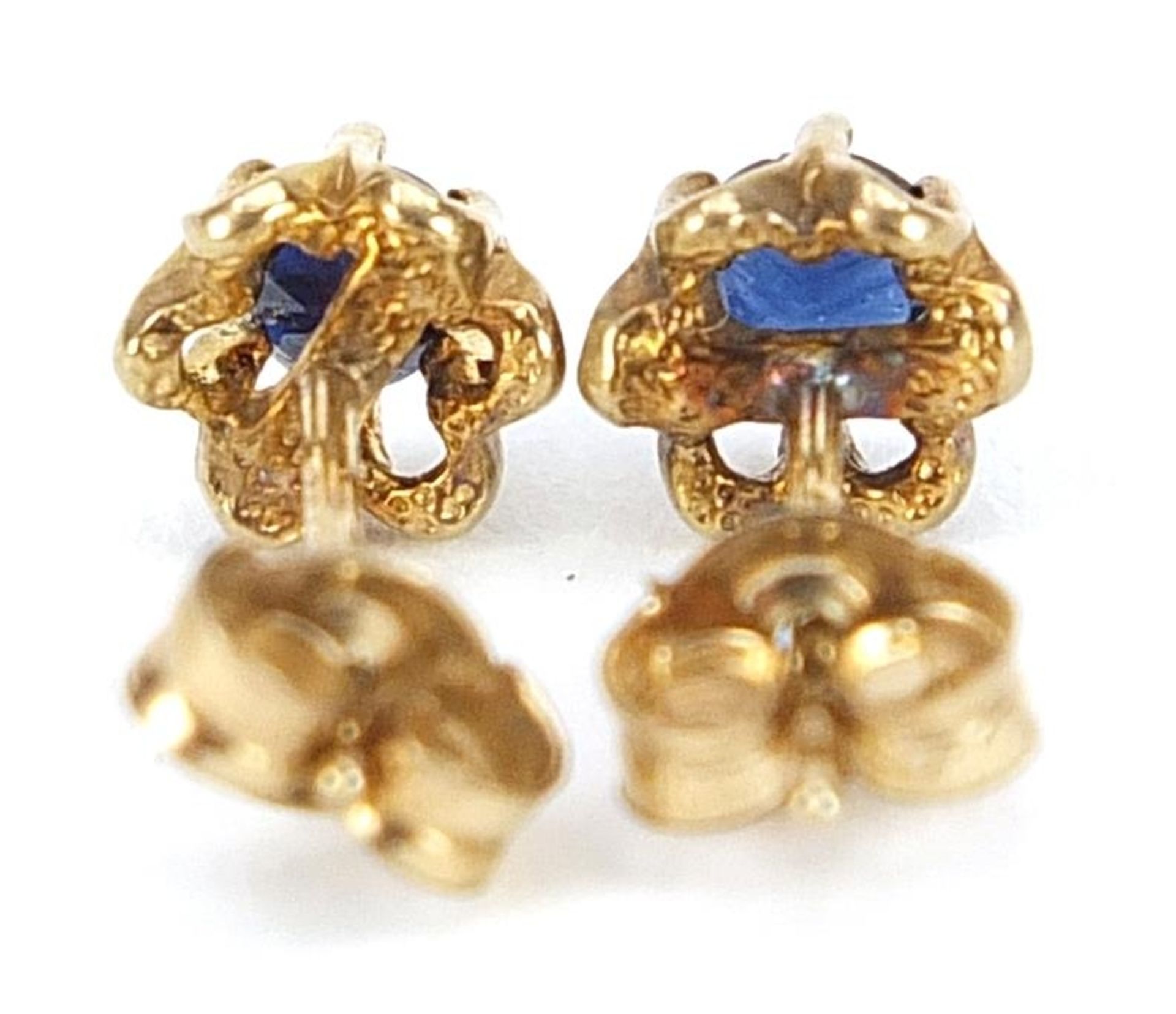 Pair of 9ct gold sapphire solitaire stud earrings, 4.5mm in diameter, 0.8g - Image 2 of 2