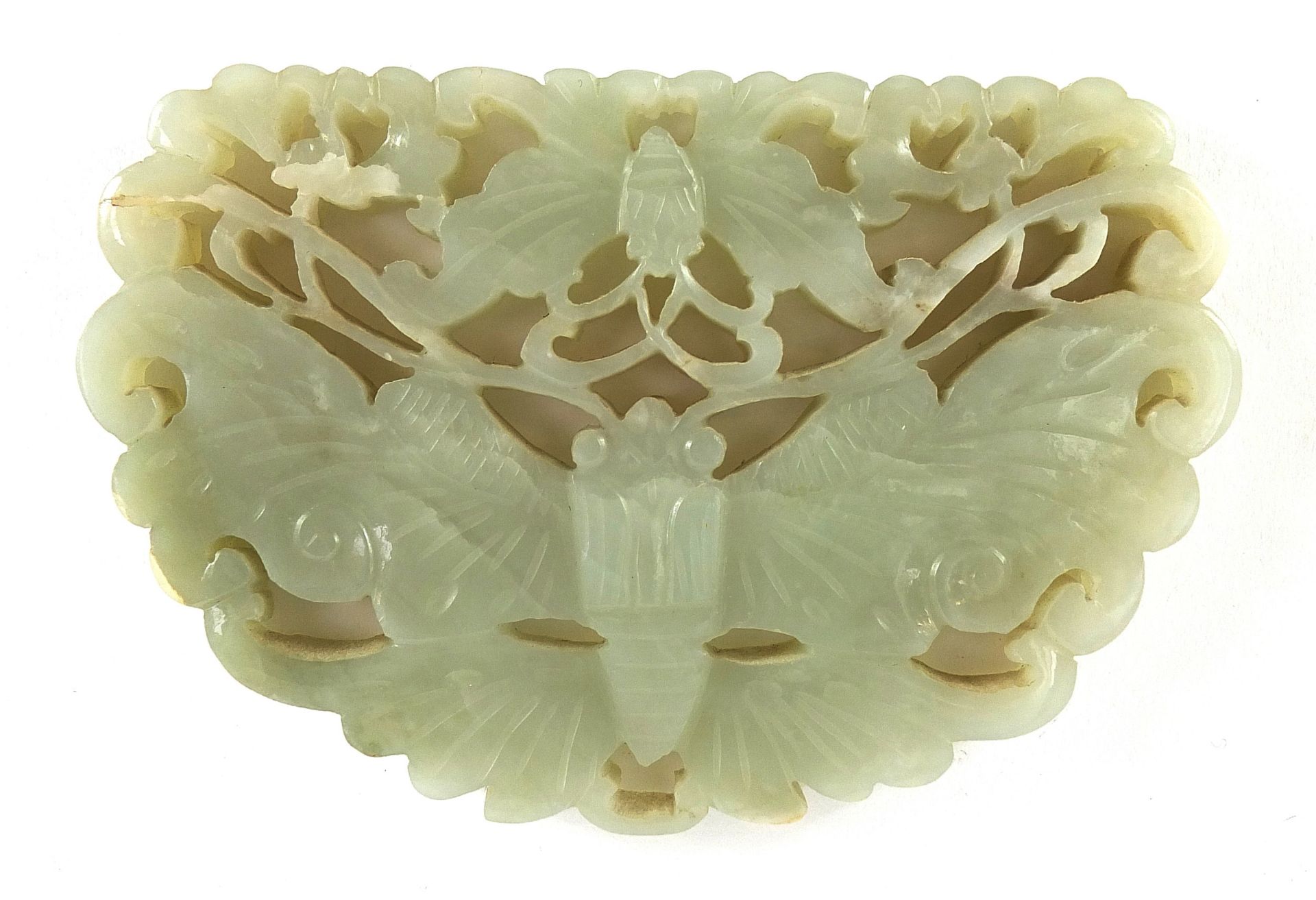 Chinese celadon and russet jade panel carved with two butterflies raised on carved hardwood stand, - Image 6 of 8