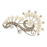 Palladium diamond and cultured pearl brooch housed in a Cadari box, 4.2cm wide, 7.3g