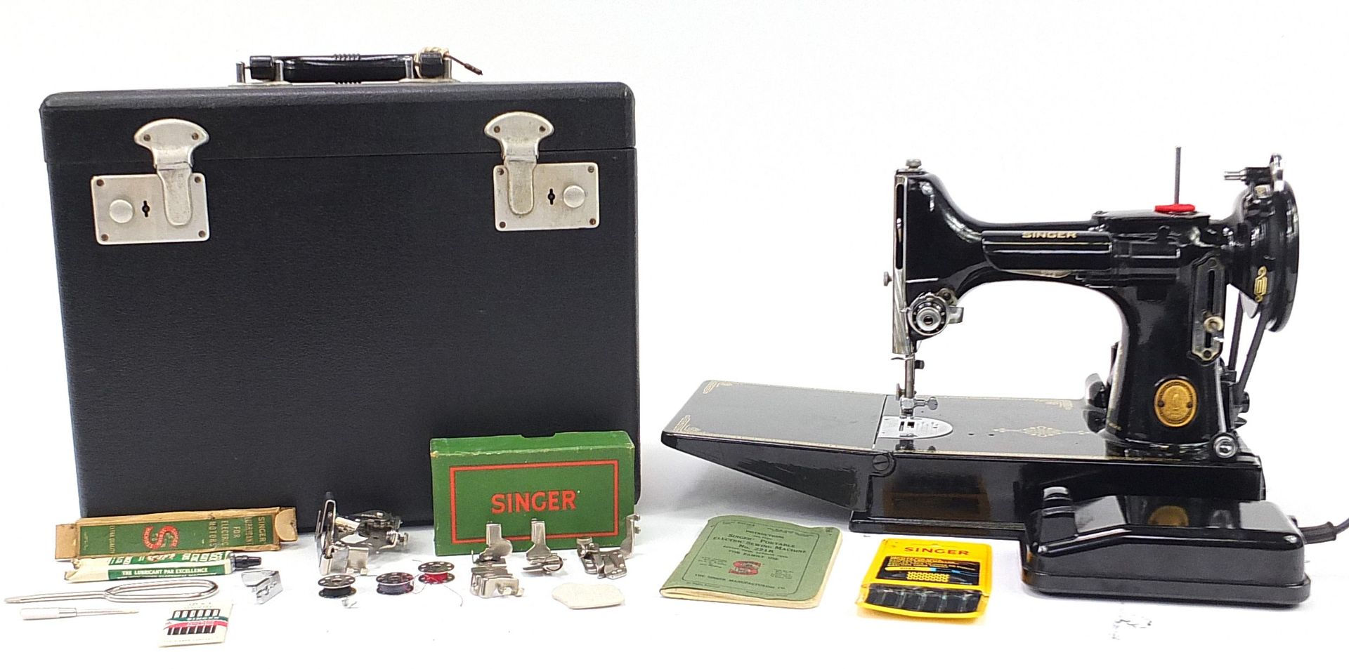 Vintage Singer 221K Featherweight electric sewing machine with fitted case