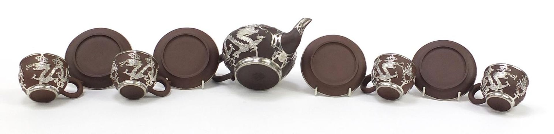 Chinese Yixing terracotta four place tea service with pewter dragon design overlay, various - Image 6 of 7