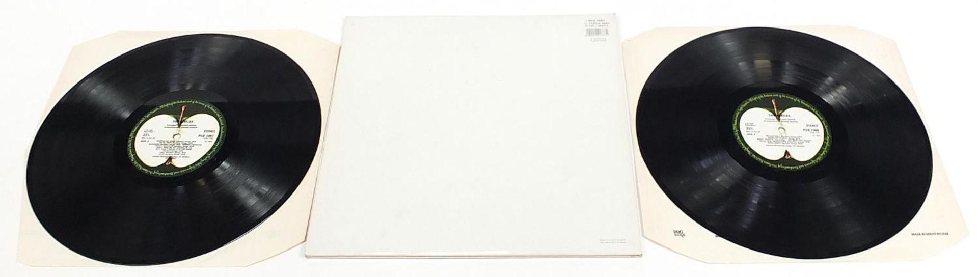 Four White Album vinyl LP records by The Beatles with posters and photographs comprising numbers - Image 11 of 17