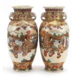 Pair of Japanese Satsuma pottery vases with twin handles hand painted with figures and flowers, each