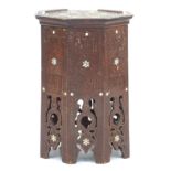 Manner of Liberty & Co octagonal Moorish style occasional table with mother of pearl inlay, carved