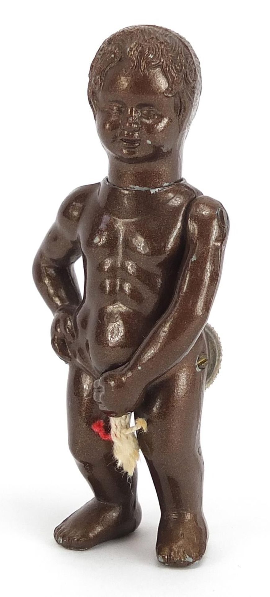 Novelty painted metal lighter in the form of a nude boy, marks to the reverse, 8cm high