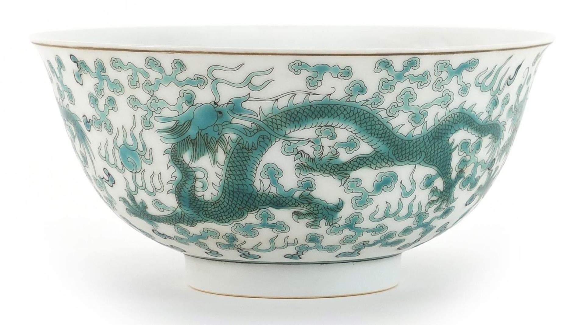 Chinese porcelain bowl decorated in green with dragons chasing a flaming pearl amongst clouds, six - Image 2 of 3