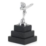 Chromed Rolls Royce Spirit of Ecstasy car mascot style paperweight raised on a square stepped marble
