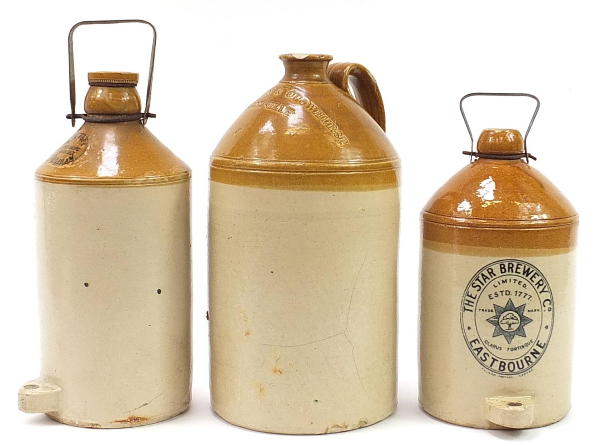 Three large vintage stoneware advertising flagons comprising Star Brewery Eastbourne, R H Pope