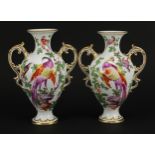 Pair of 19th century Chelsea style porcelain vases with twin handles, each hand painted with