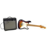 Rockwood by Hohner electric guitar with a Fender Frontman 15G amplifier
