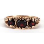 9ct gold garnet and diamond ring, size M, 2.9g