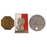 Two military interest badges and a dog tag impressed William M A Williams