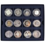Twelve commemorative coins, probably all silver including 2010 Britannia one ounce silver two pounds