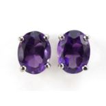 Pair of silver oval amethyst stud earrings, 8mm high, 1.5g