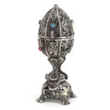 Russian silver filigree egg shaped trinket opening to reveal a lion, set with turquoise and coral