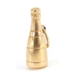 Unmarked 9ct gold wine bottle charm, 1.8cm high, 1.2g