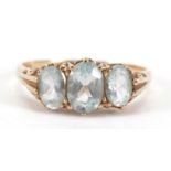 9ct gold aquamarine three stone ring, size S, 2.7g