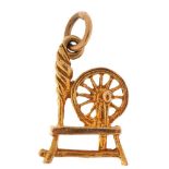 9ct gold spinning wheel charm, 1.8cm high, 1.8g