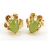 Pair of unmarked 14ct gold cabochon jade stud earrings, 6mm high, 1.2g