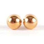 Pair of 18ct gold stud earrings with 9ct gold backs, 8mm in diameter, 1.4g