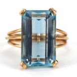 Unmarked gold blue stone ring, possibly aquamarine or topaz, (tests as 15ct+ gold) size M, 4.9g