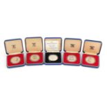 Five commemorative silver proof coins with cases including 1998 United Kingdom crown commemorating